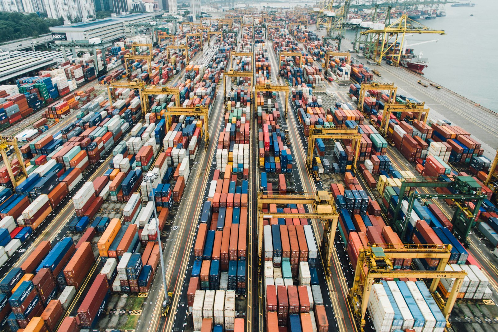 Aerial view of a container terminal with stacked freight containers