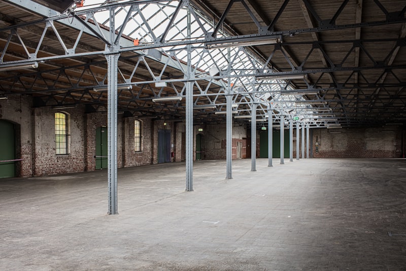 Empty industrial hall with steel columns