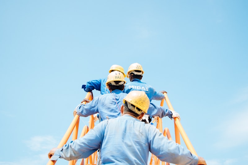 Construction crew erecting formwork on a civil works site